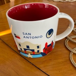 This is a Starbucks San Antonio mug. It is 14 Fl oz/ 414 ml.